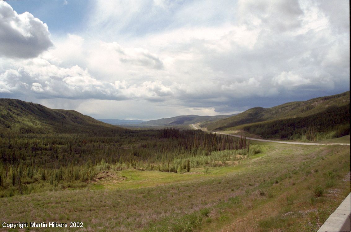 Alaska Highway : Watson Lake - Coal River / Thuderstorm in pursuit. Click to see full size image